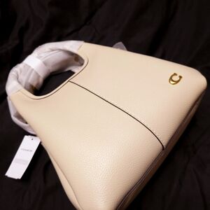 Elegant Cream Coach Original Bag